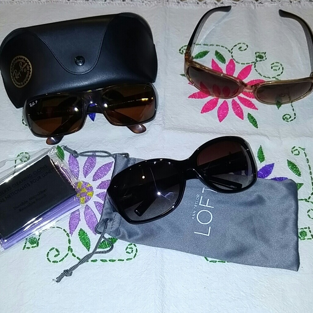 Three pair of Sunglasses together
